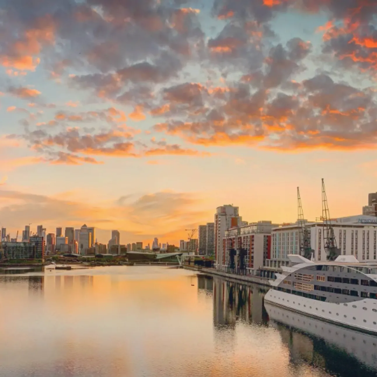 Royal Docks looking towards Canary Wharf with Sunborn Yacht